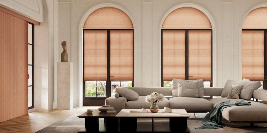 Custom window treatments installed over floor-to-ceiling windows.