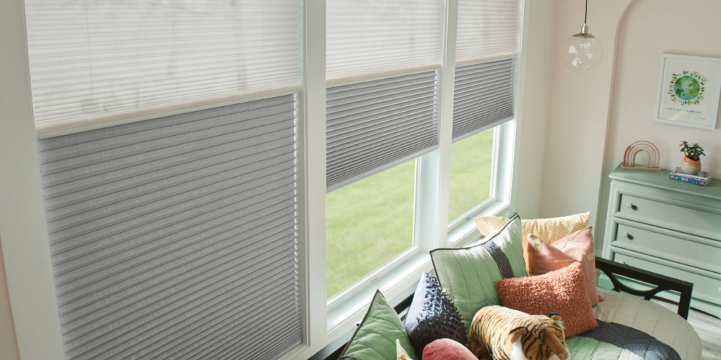 Cellular shades in large windows in a St. Louis home.