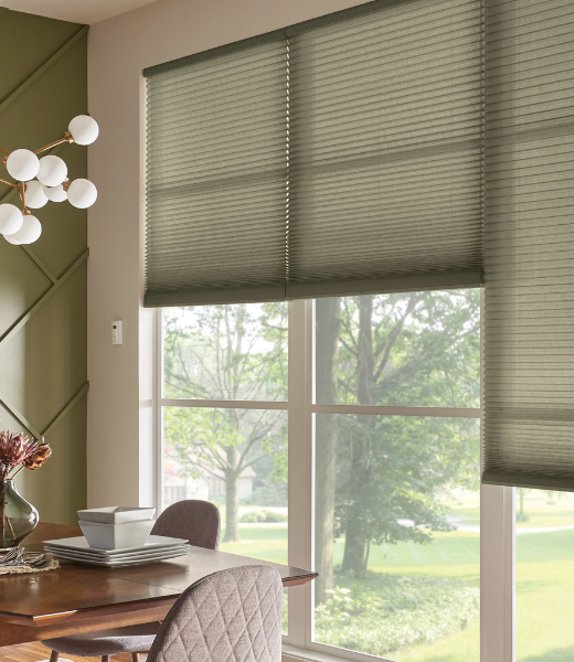 Custom window shades installed in a suburban dining room.