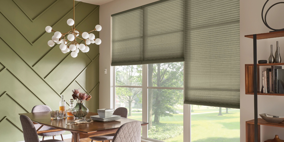 Custom window shades installed in a suburban dining room.