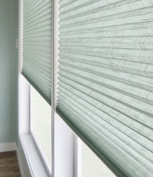 Heat blocking shades in a living room window