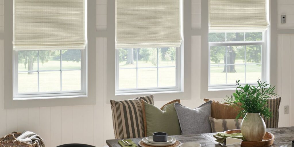 Custom natural fiber shades in a residential living room.