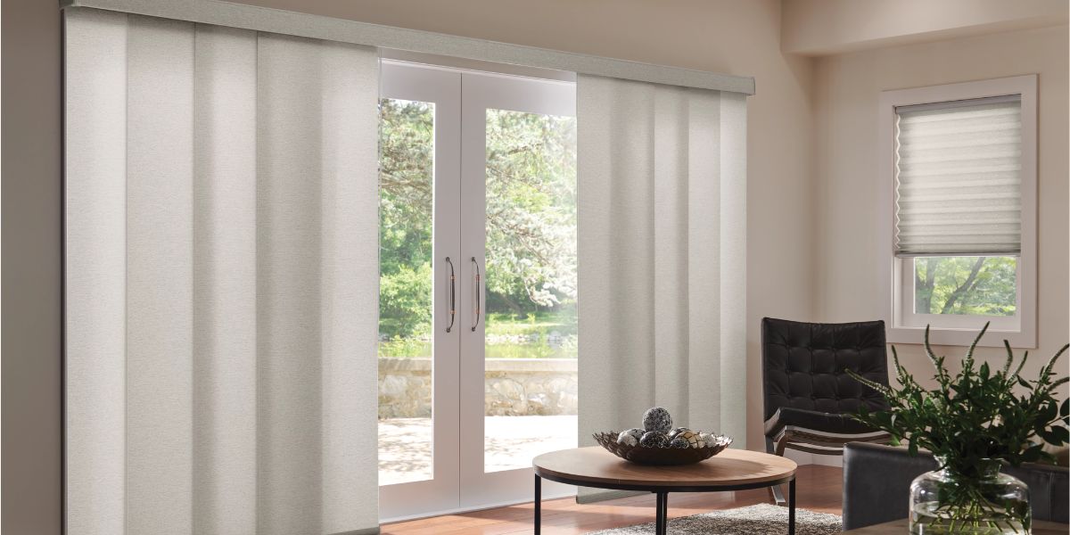 Sliding panel shades over large double doors