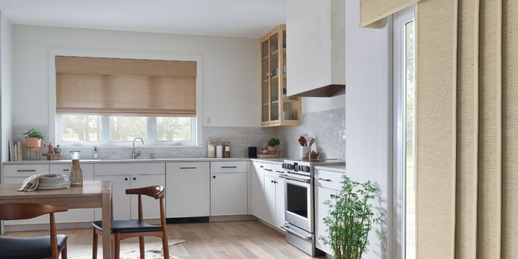 Sliding shade panels installed in a residential kitchen.